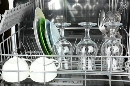 Open Dishwasher With Clean Utensils