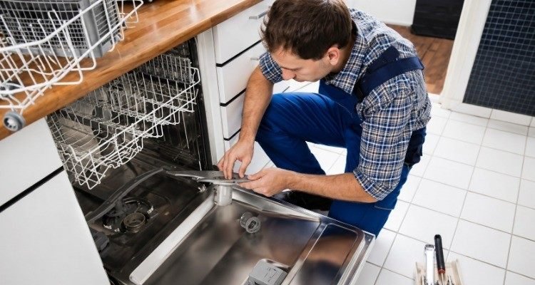 Sparkle Appliance Technician Repairing Dishwasher