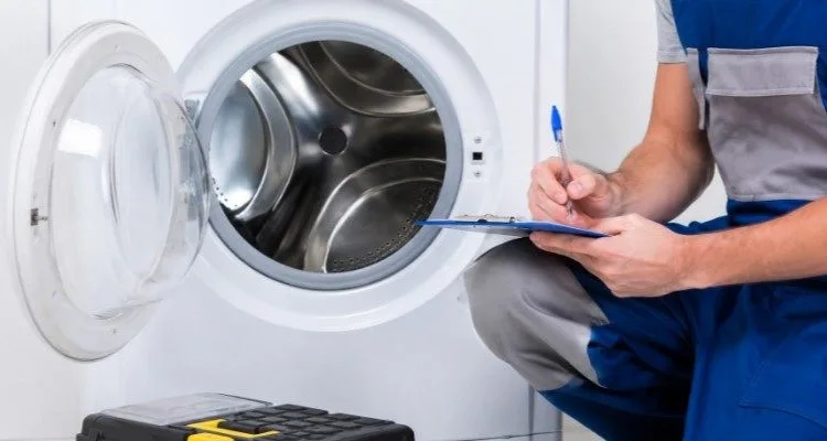 Sparkle Appliance Technician Repairing Dryer