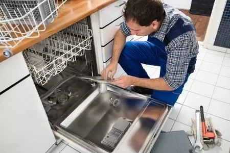 Sparkle Appliance Repair Near Me Technician Repairing Kitchen Appliance