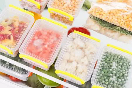 Vegetables On Freezer Shelves